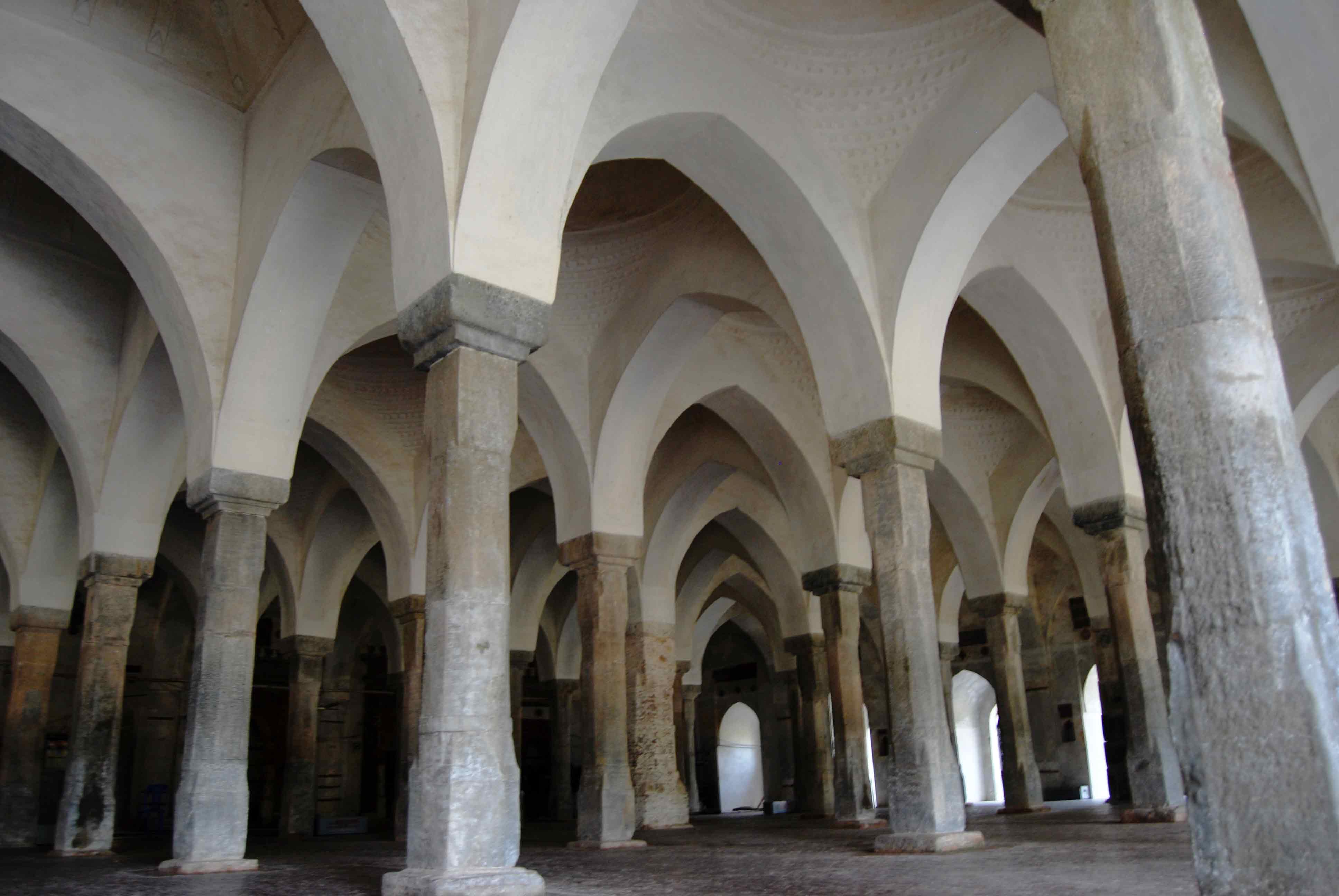 Interior view of Sixty Dome Mosque columns and arches